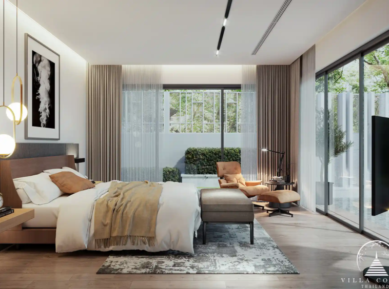 The Laytin Villa Bangtao, showcasing the elegant modern architecture and lush tropical surroundings