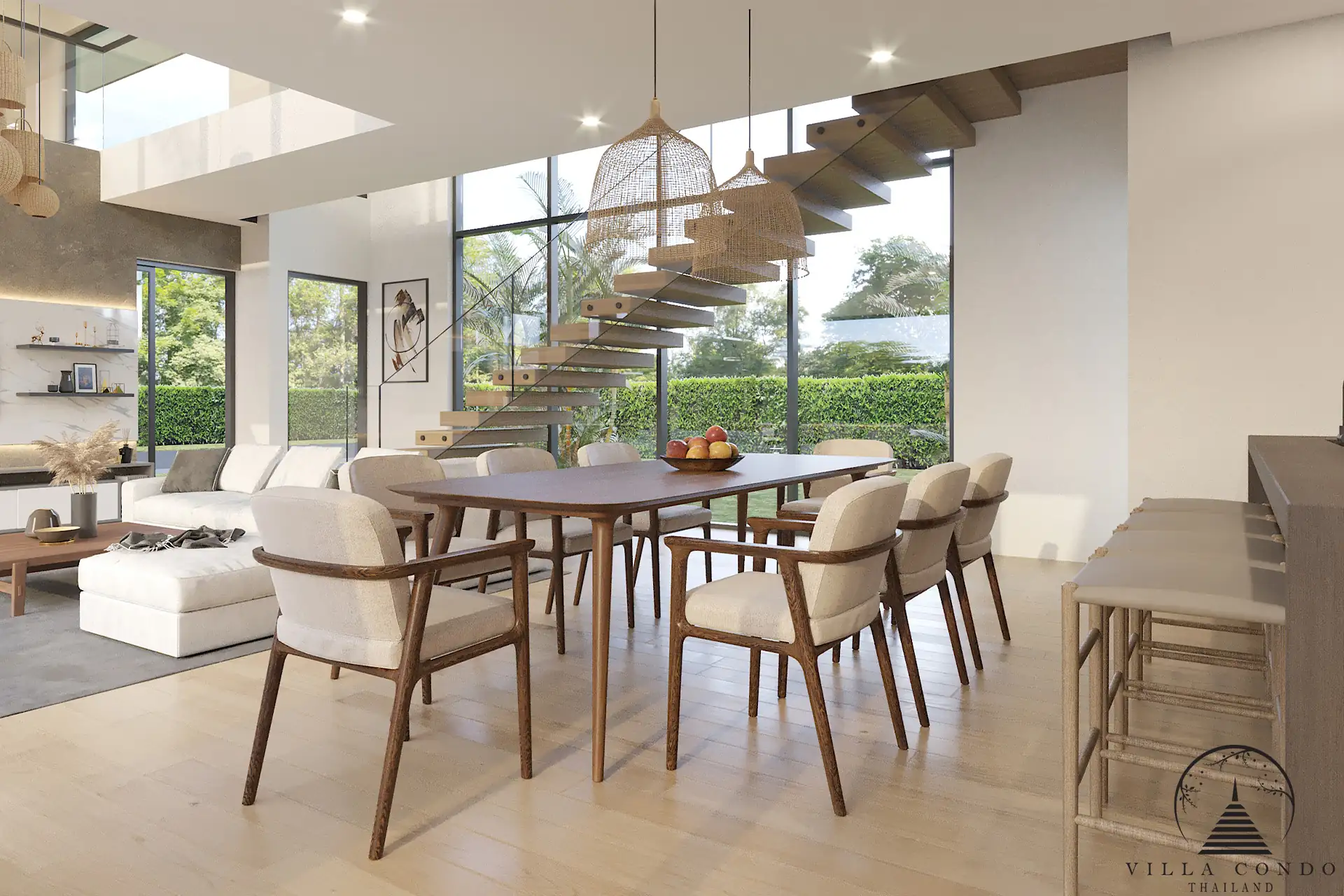Villa Suksan, showcasing its modern architecture, spacious sundeck, and lush tropical surroundings.