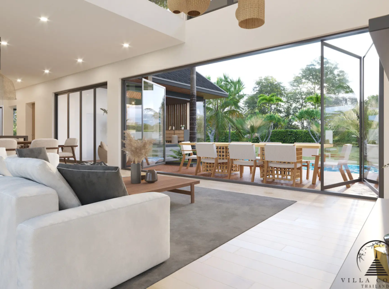 Villa Suksan, showcasing its modern architecture, spacious sundeck, and lush tropical surroundings.