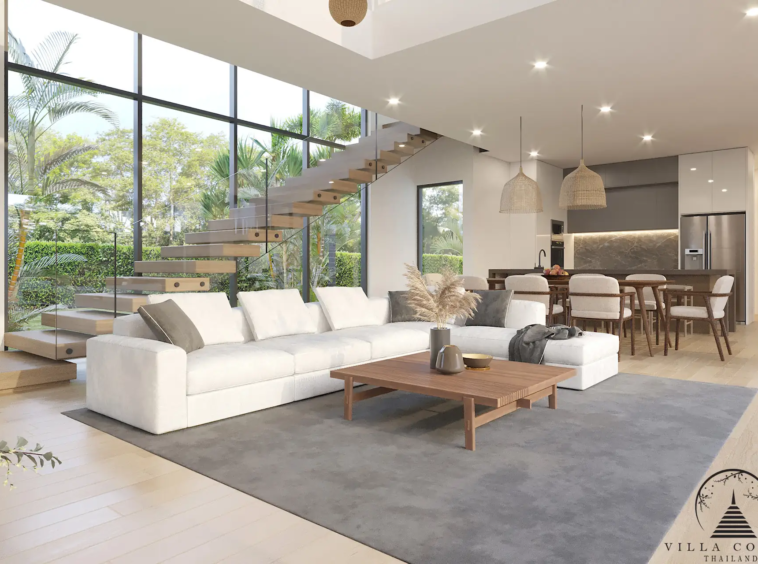 Villa Suksan, showcasing its modern architecture, spacious sundeck, and lush tropical surroundings.