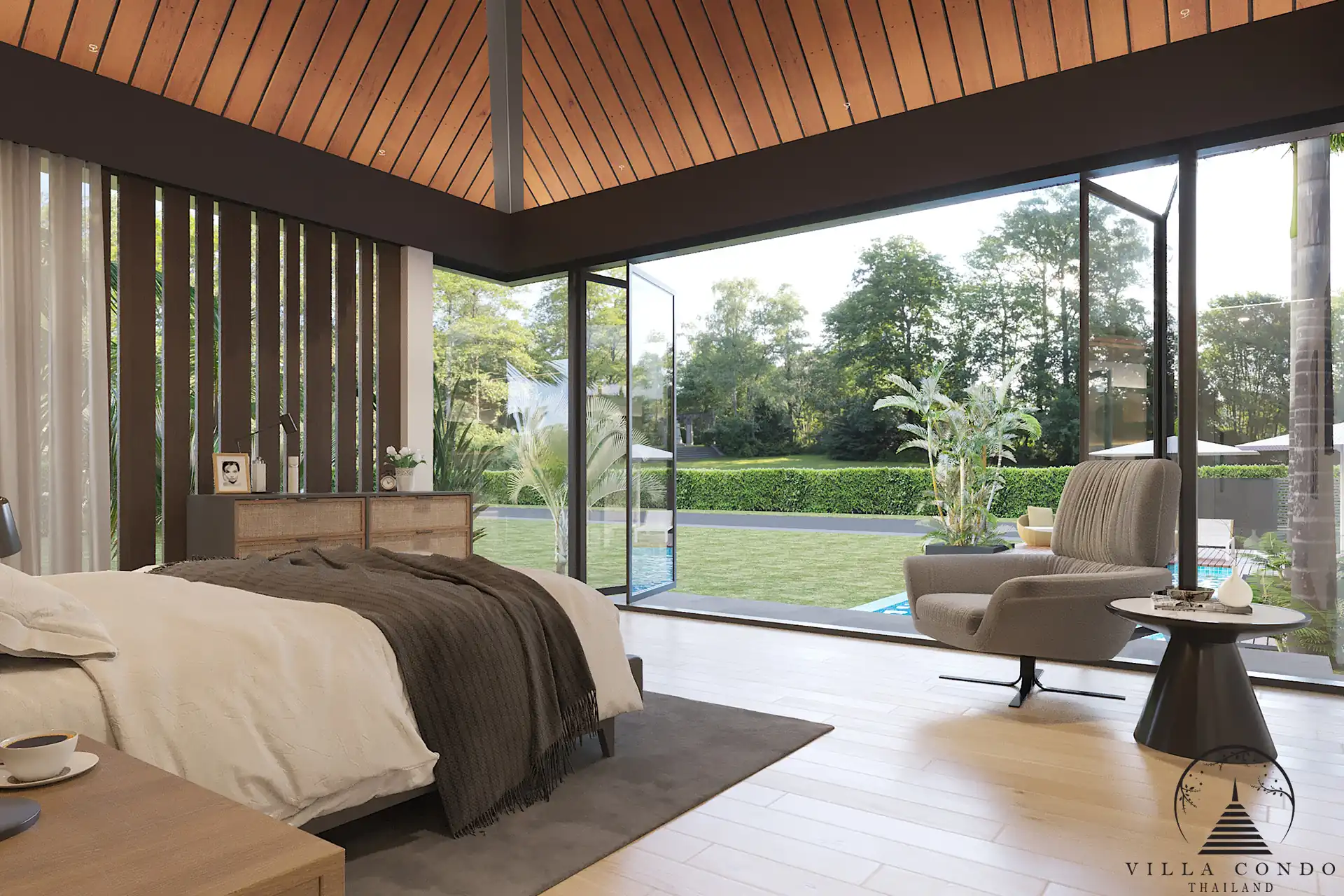 Villa Suksan, showcasing its modern architecture, spacious sundeck, and lush tropical surroundings.