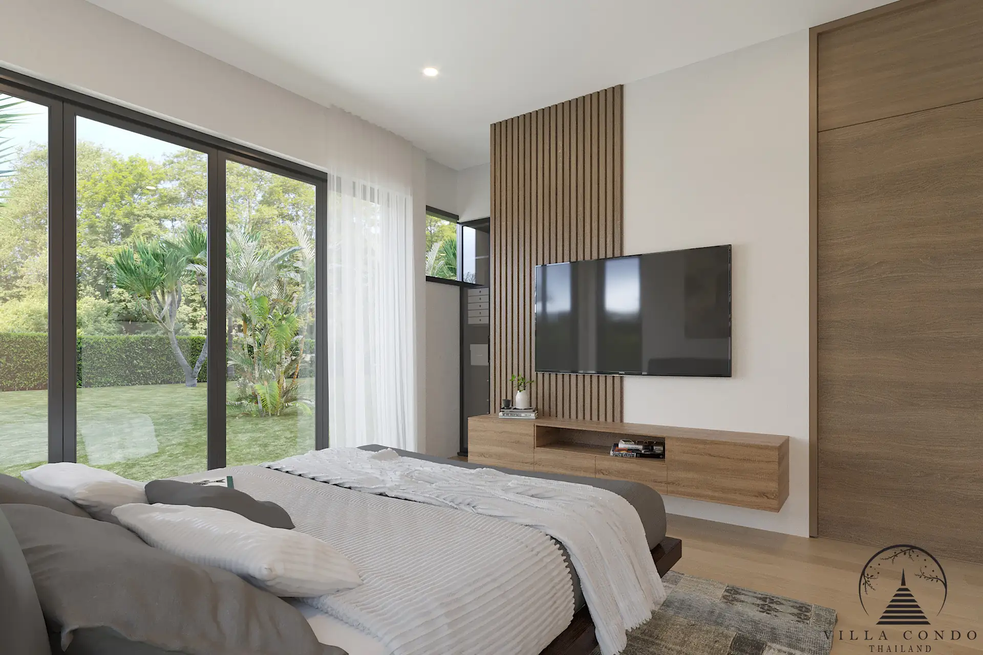 Villa Suksan, showcasing its modern architecture, spacious sundeck, and lush tropical surroundings.