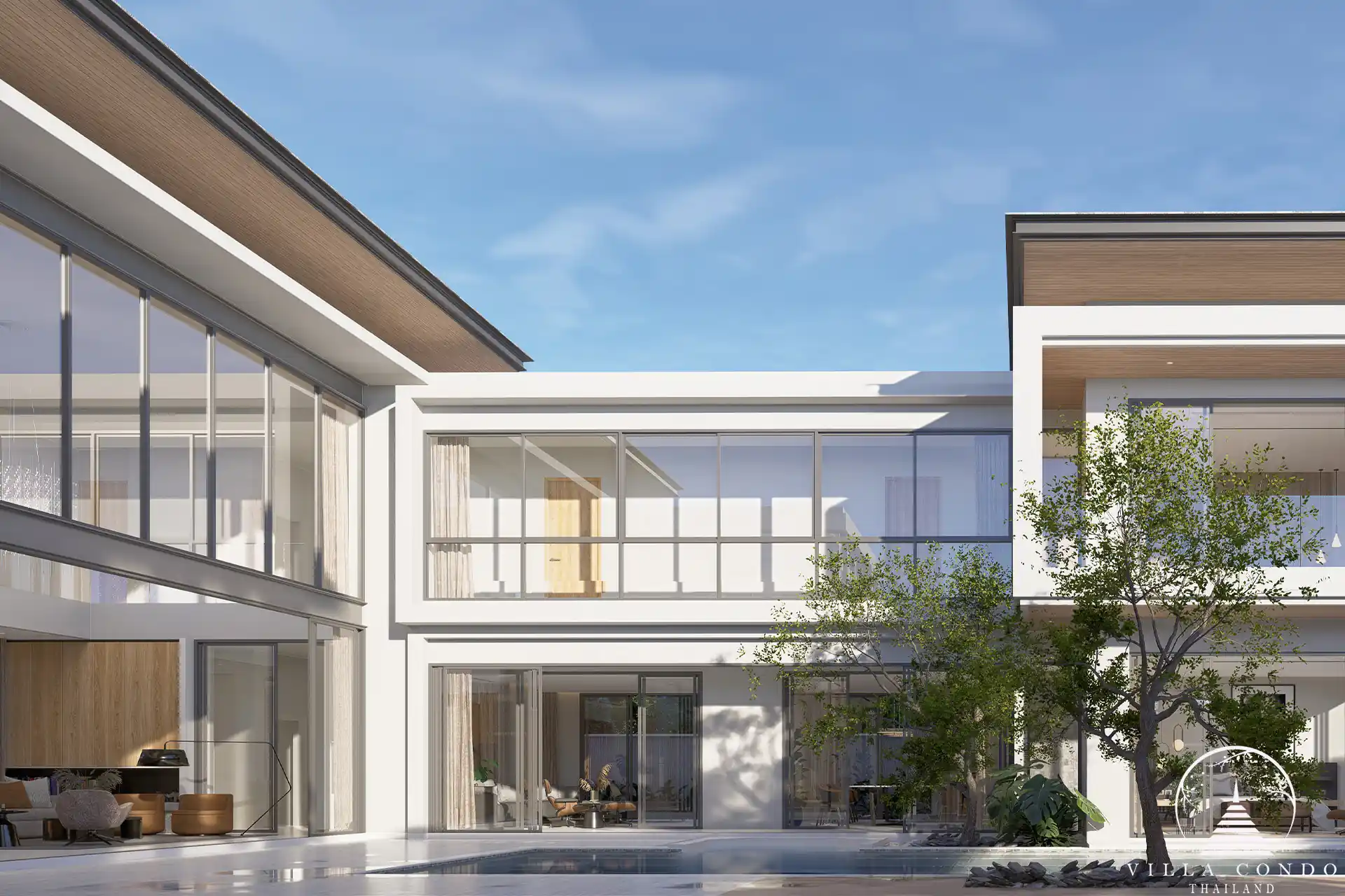 The Laytin Villa Bangtao, showcasing the elegant modern architecture and lush tropical surroundings