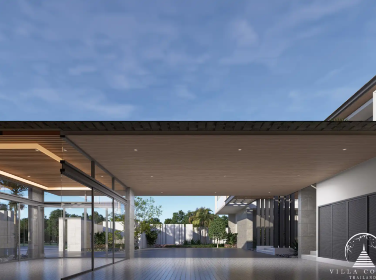 The Laytin Villa Bangtao, showcasing the elegant modern architecture and lush tropical surroundings