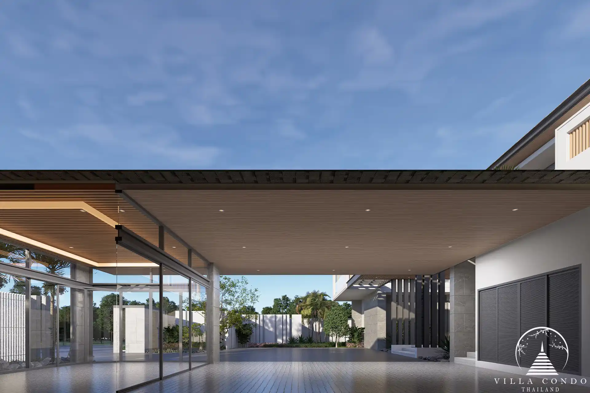 The Laytin Villa Bangtao, showcasing the elegant modern architecture and lush tropical surroundings