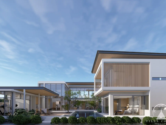 The Laytin Villa Bangtao, showcasing the elegant modern architecture and lush tropical surroundings