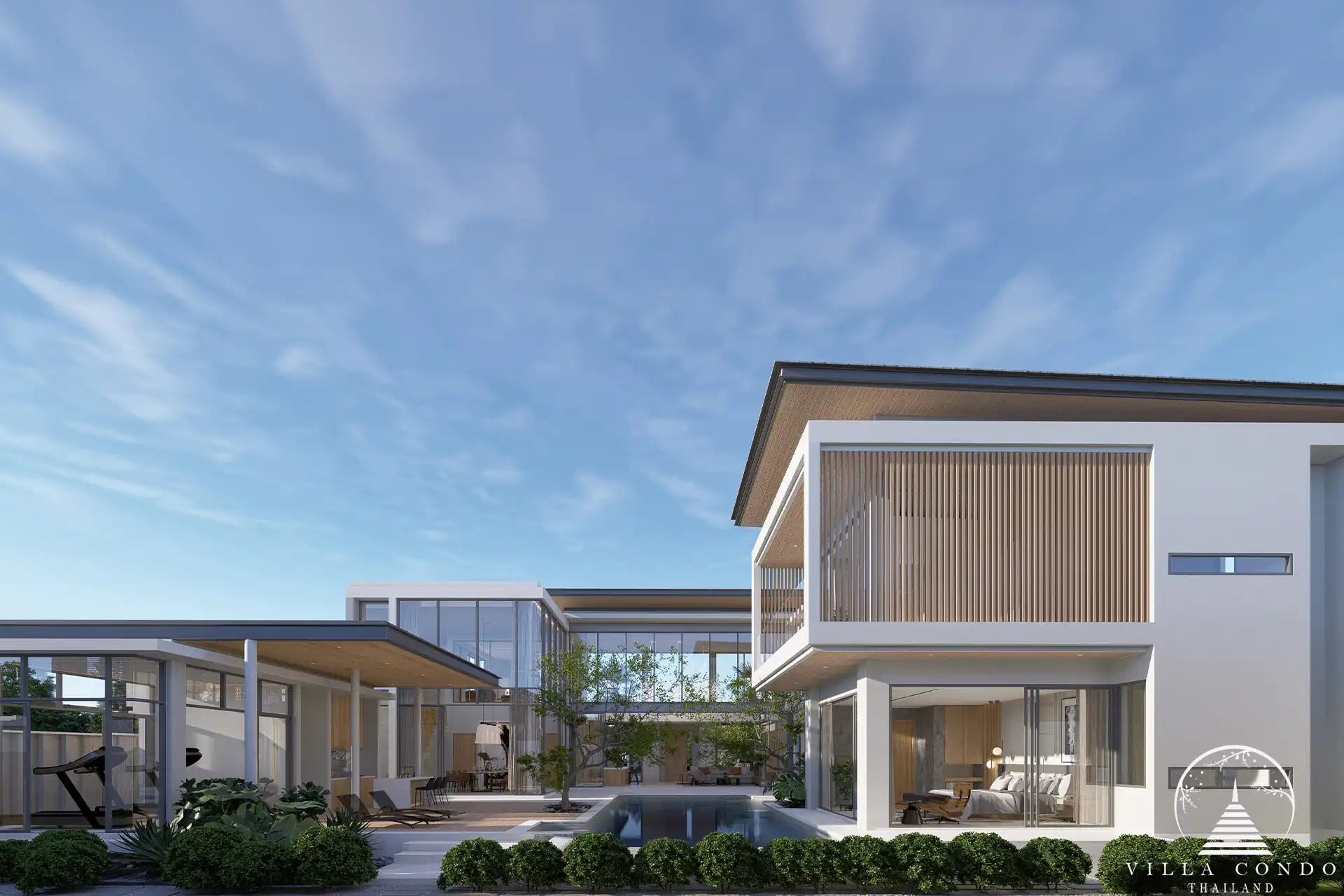 The Laytin Villa Bangtao, showcasing the elegant modern architecture and lush tropical surroundings