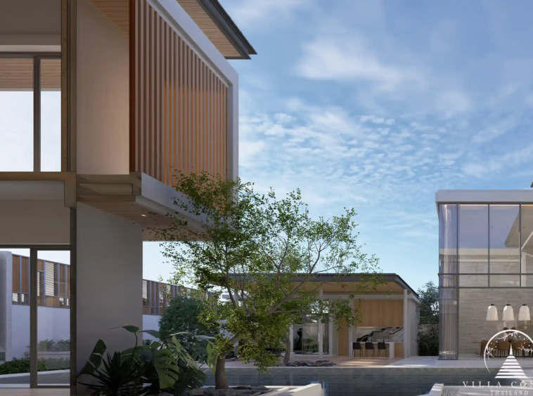 The Laytin Villa Bangtao, showcasing the elegant modern architecture and lush tropical surroundings