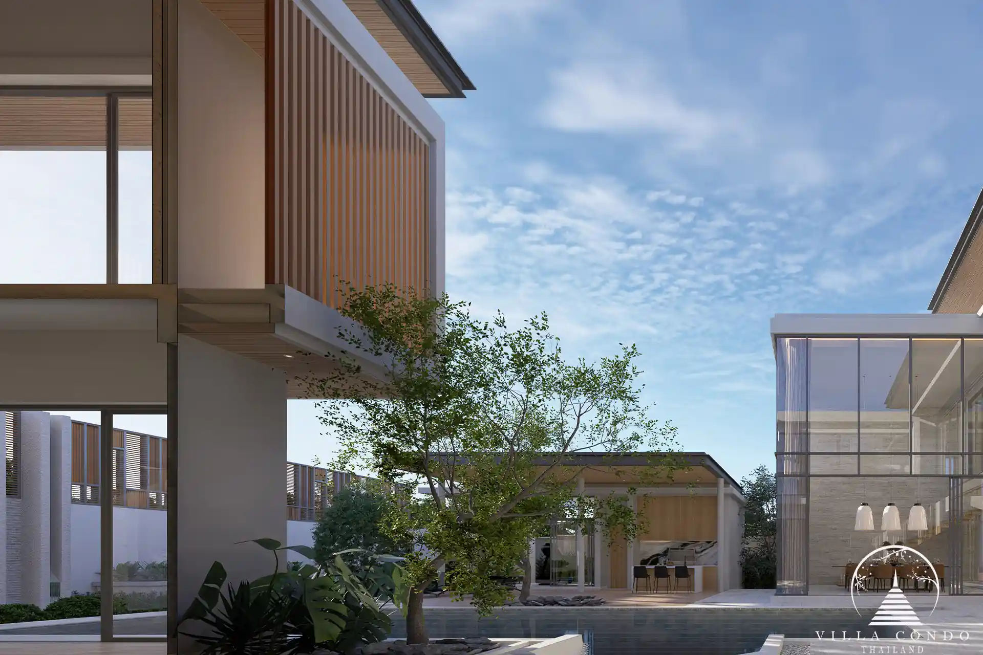 The Laytin Villa Bangtao, showcasing the elegant modern architecture and lush tropical surroundings