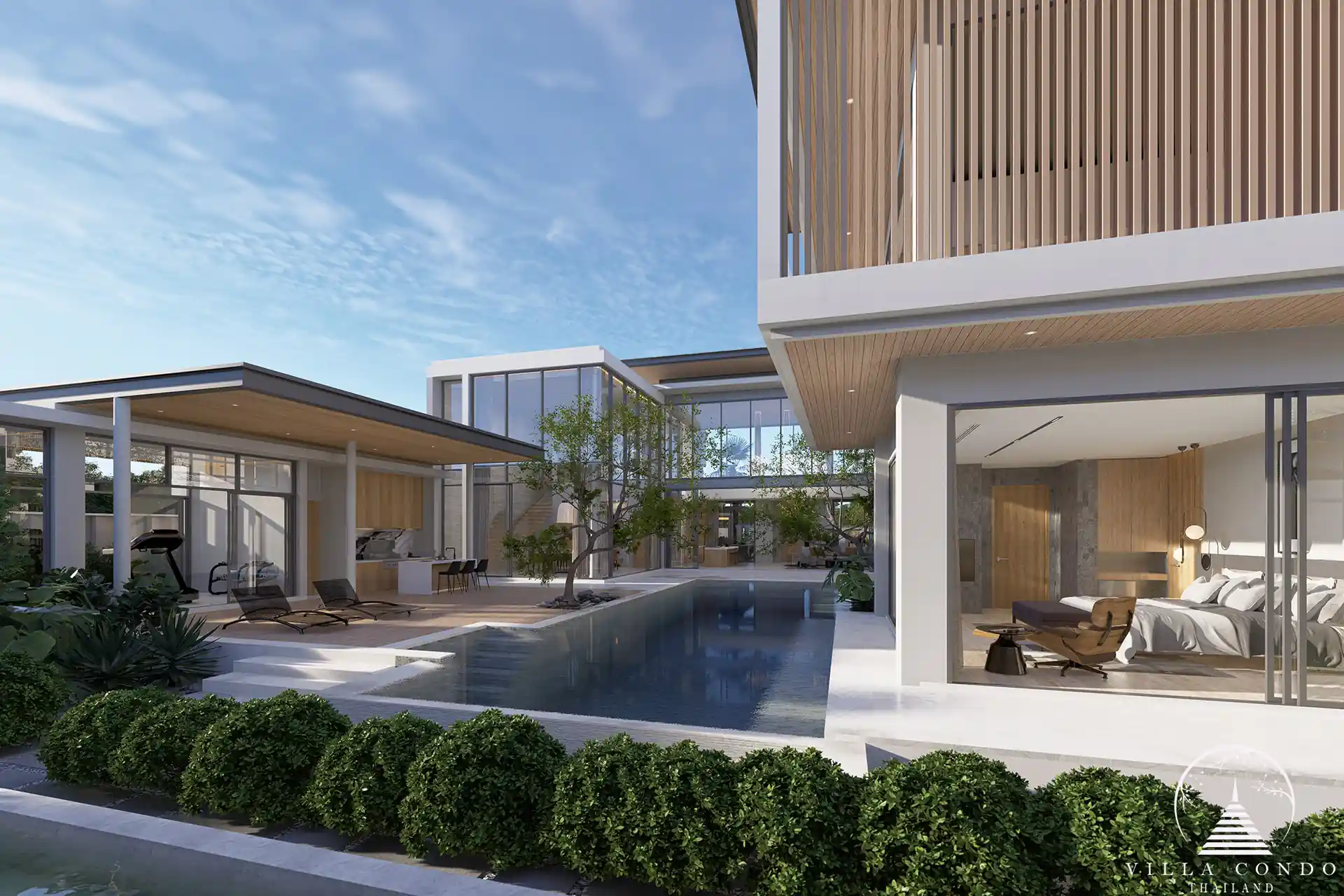 The Laytin Villa Bangtao, showcasing the elegant modern architecture and lush tropical surroundings