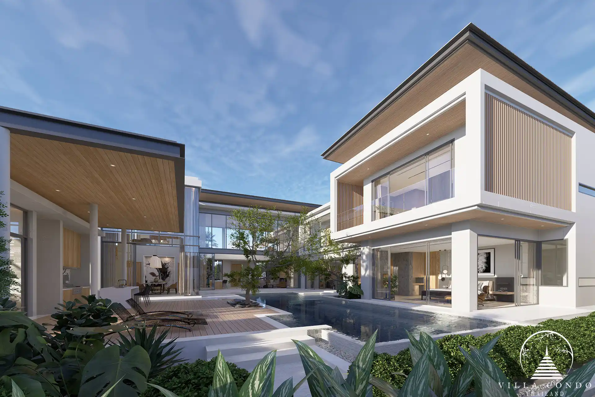The Laytin Villa Bangtao, showcasing the elegant modern architecture and lush tropical surroundings