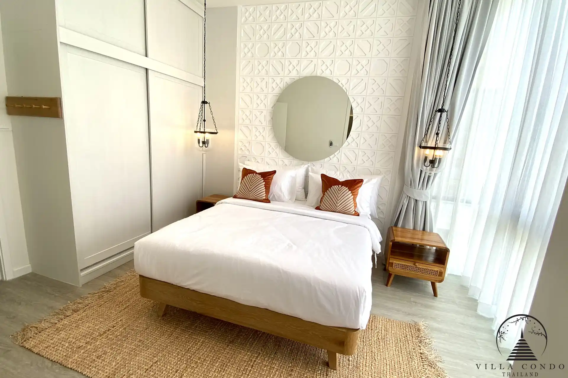 Luxurious bedroom in Alisa Pool Villas with ample storage and elegant design.
