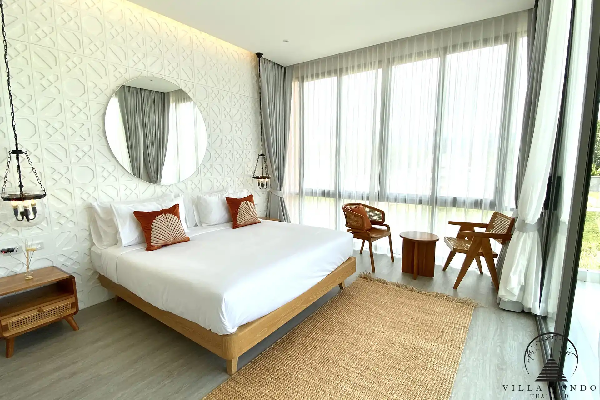 Luxurious bedroom in Alisa Pool Villas with ample storage and elegant design.