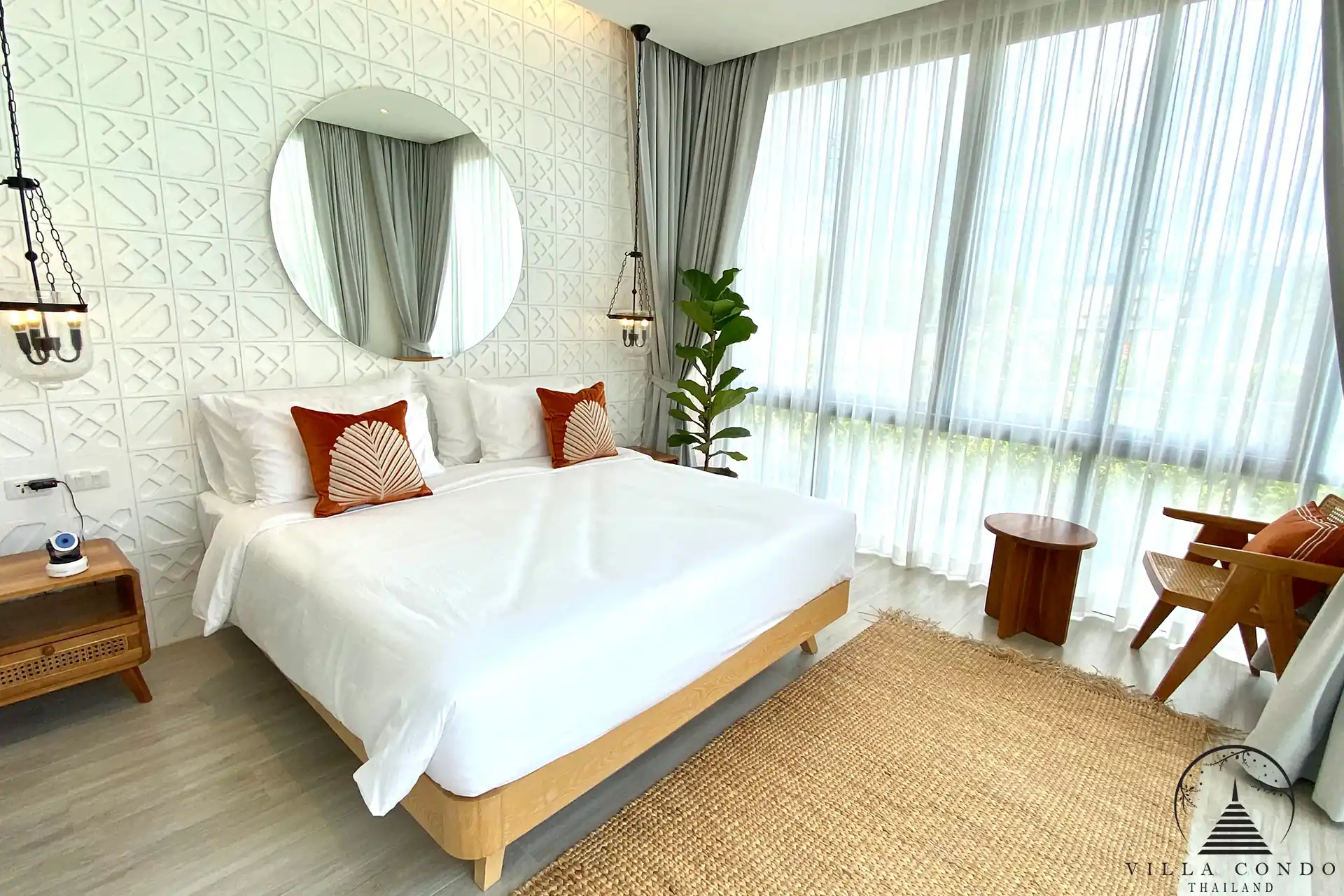 Luxurious bedroom in Alisa Pool Villas with ample storage and elegant design.