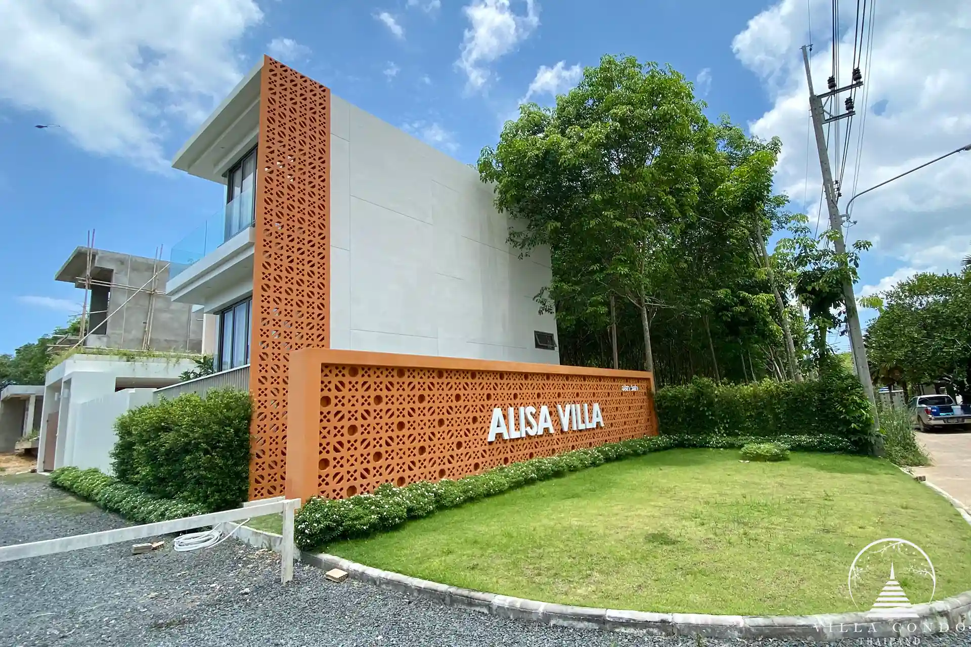 Beautifully landscaped outdoor area at Alisa Pool Villas.