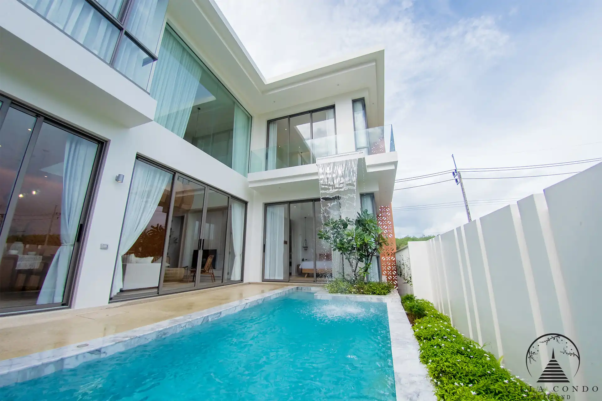 Exterior view of Alisa Pool Villas showcasing the modern Thai architecture.