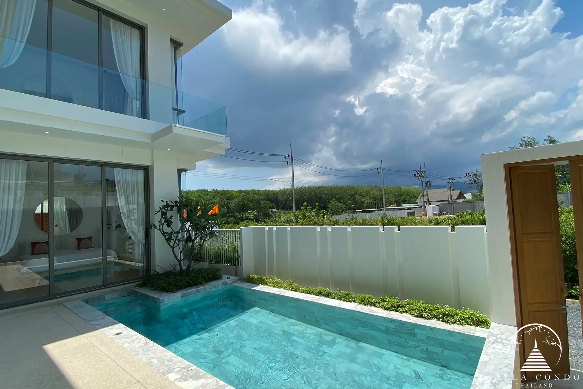 Private swimming pool with sun deck at Alisa Pool Villas.