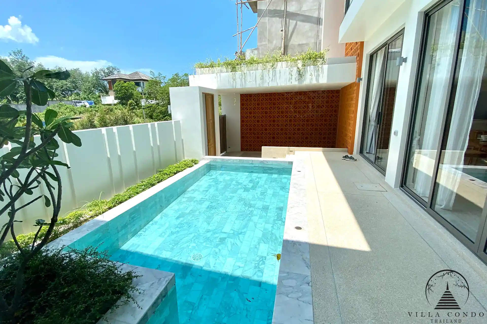 Private swimming pool with sun deck at Alisa Pool Villas.