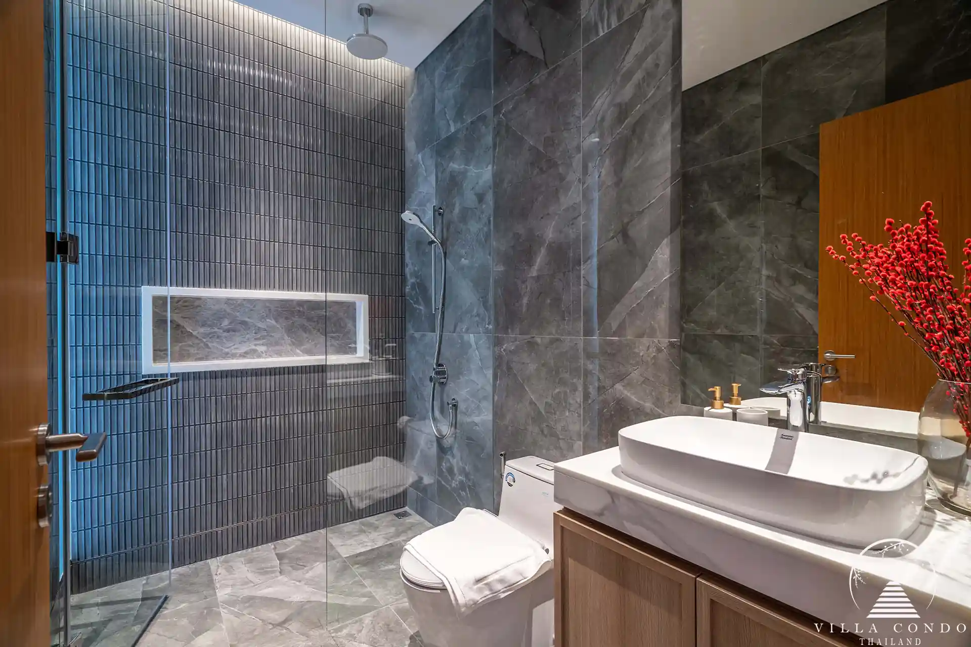 Modern bathroom in Alinda Villas with luxury fittings and fixtures.