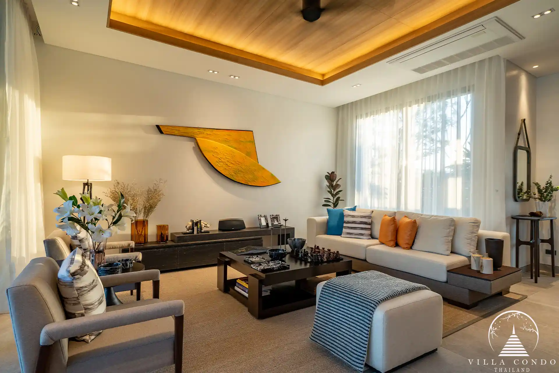 Spacious living area in Alinda Villas with comfortable seating and modern decor.