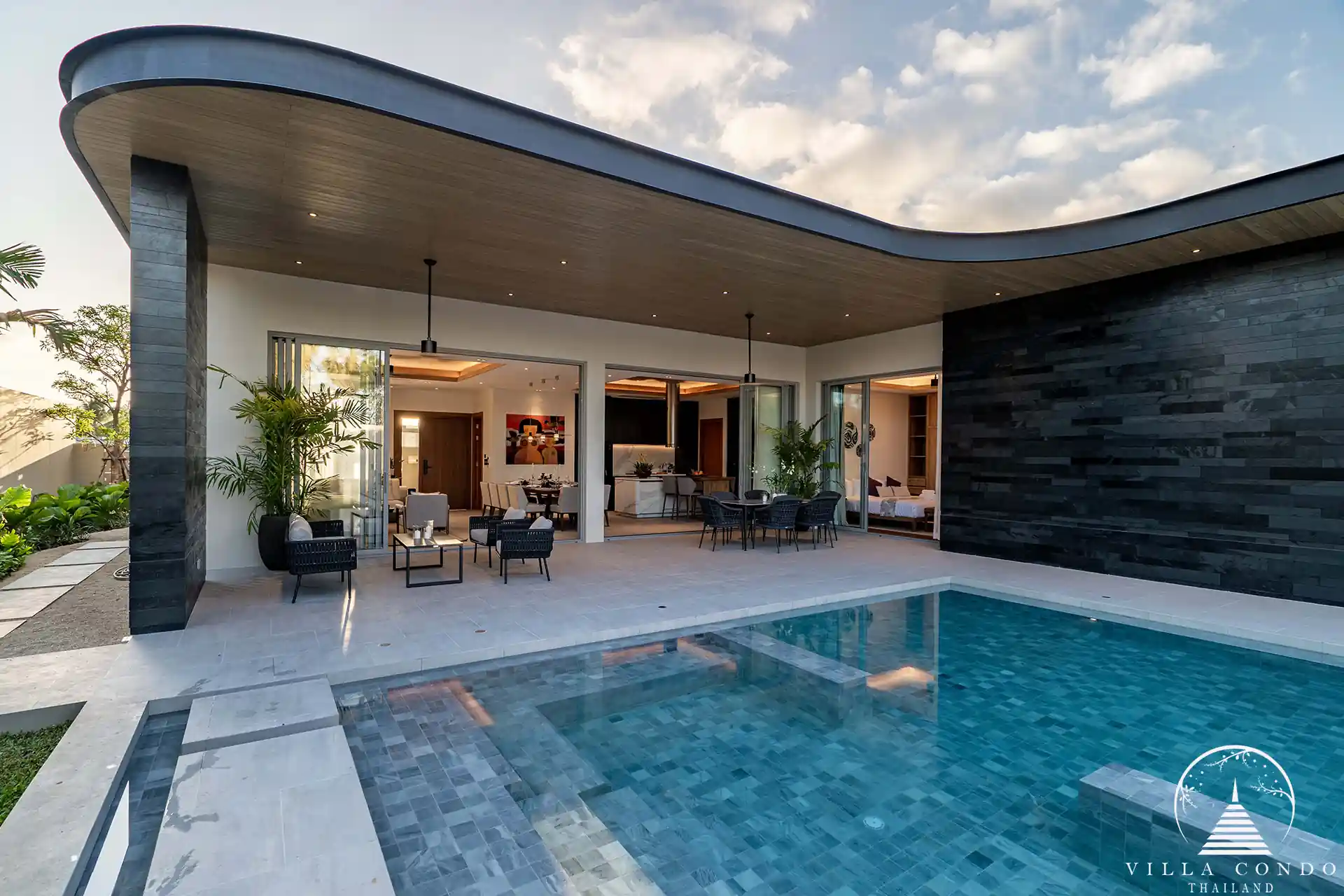 Private pool at Alinda Villas surrounded by a serene outdoor area.