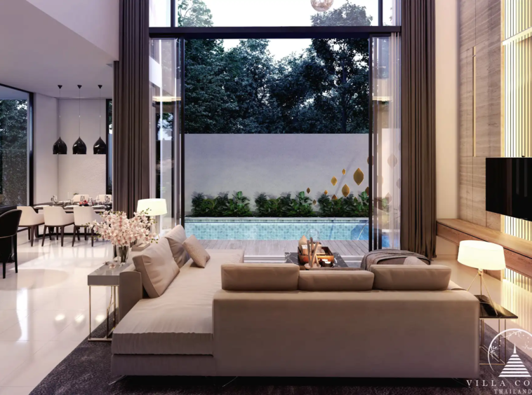Cozy living area with a sofa and pool view.