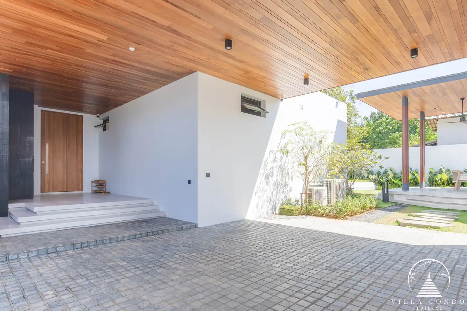The private car park at Avana Luxury Villa with EV charger.