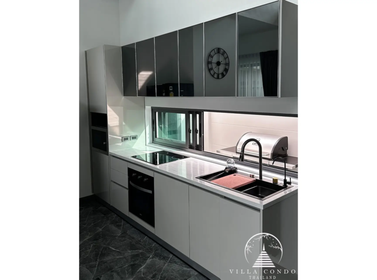 Fully-equipped modern kitchen with stylish design.