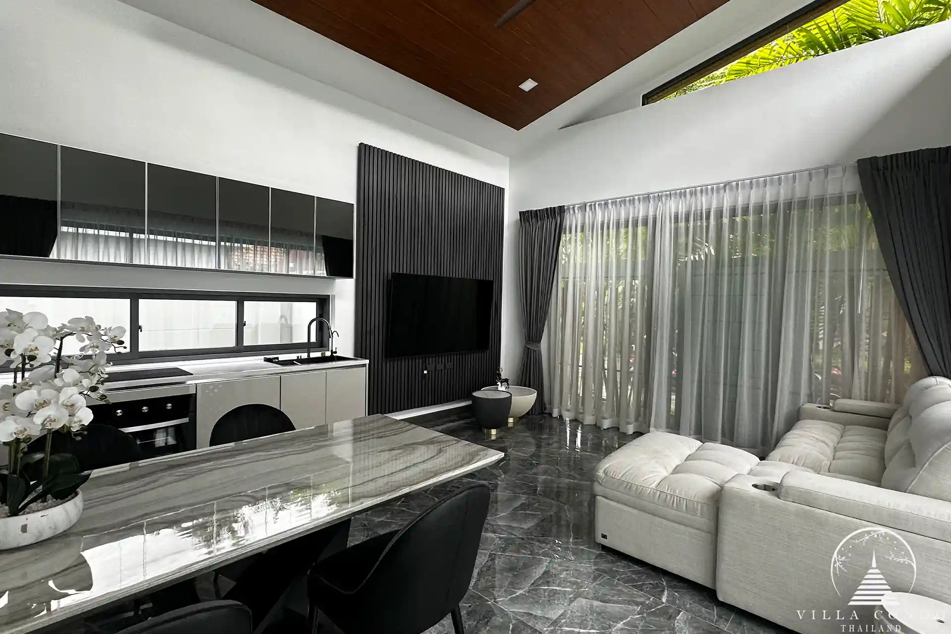 Spacious and elegantly designed living room with modern furnishings.
