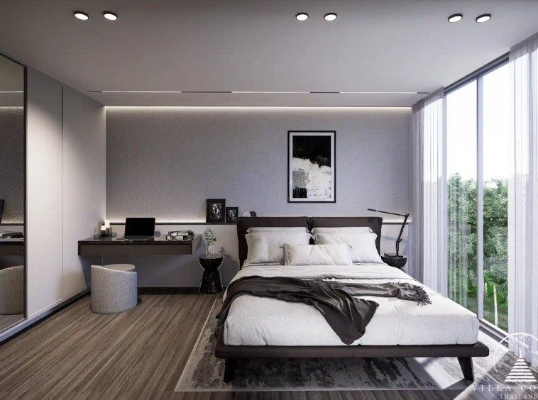 A luxurious bedroom in Enigma Residence with modern furnishings.