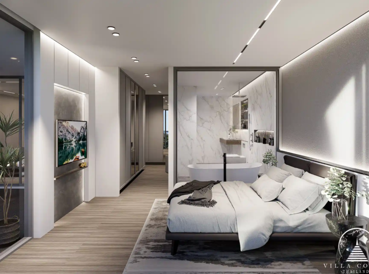 The master bedroom in Enigma Residence with a view of the sea.