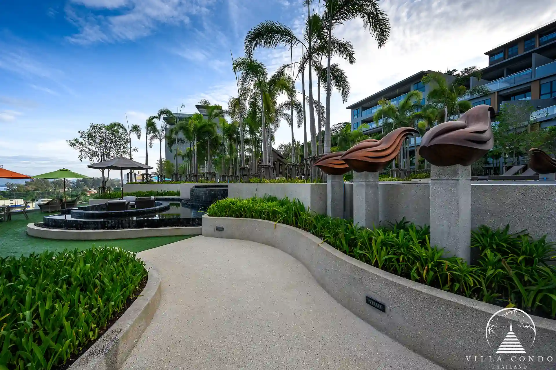 Landscaped garden area at Panora Sea View Condominium.