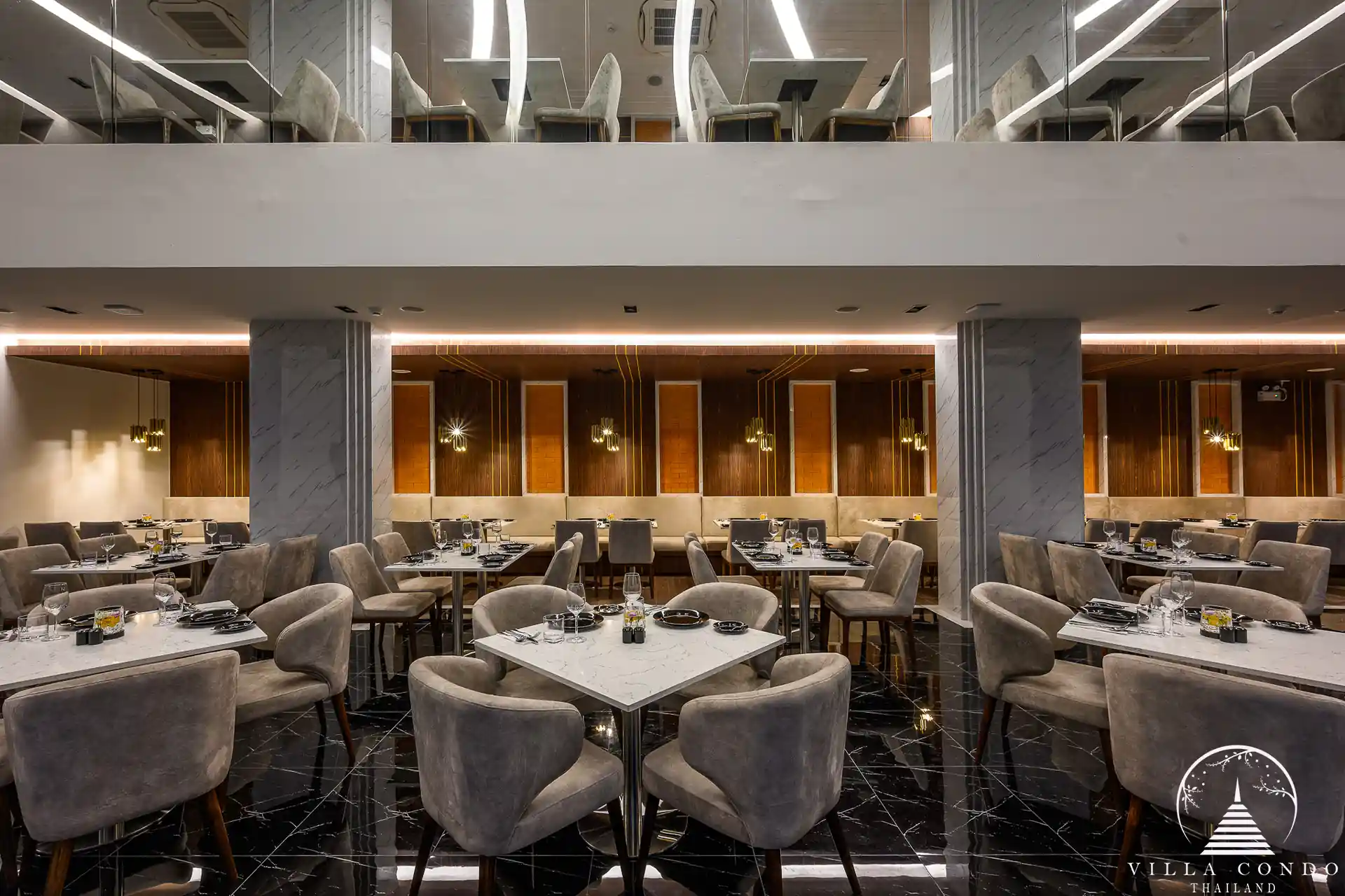 Dining area with sea views at Panora Sea View Condominium.