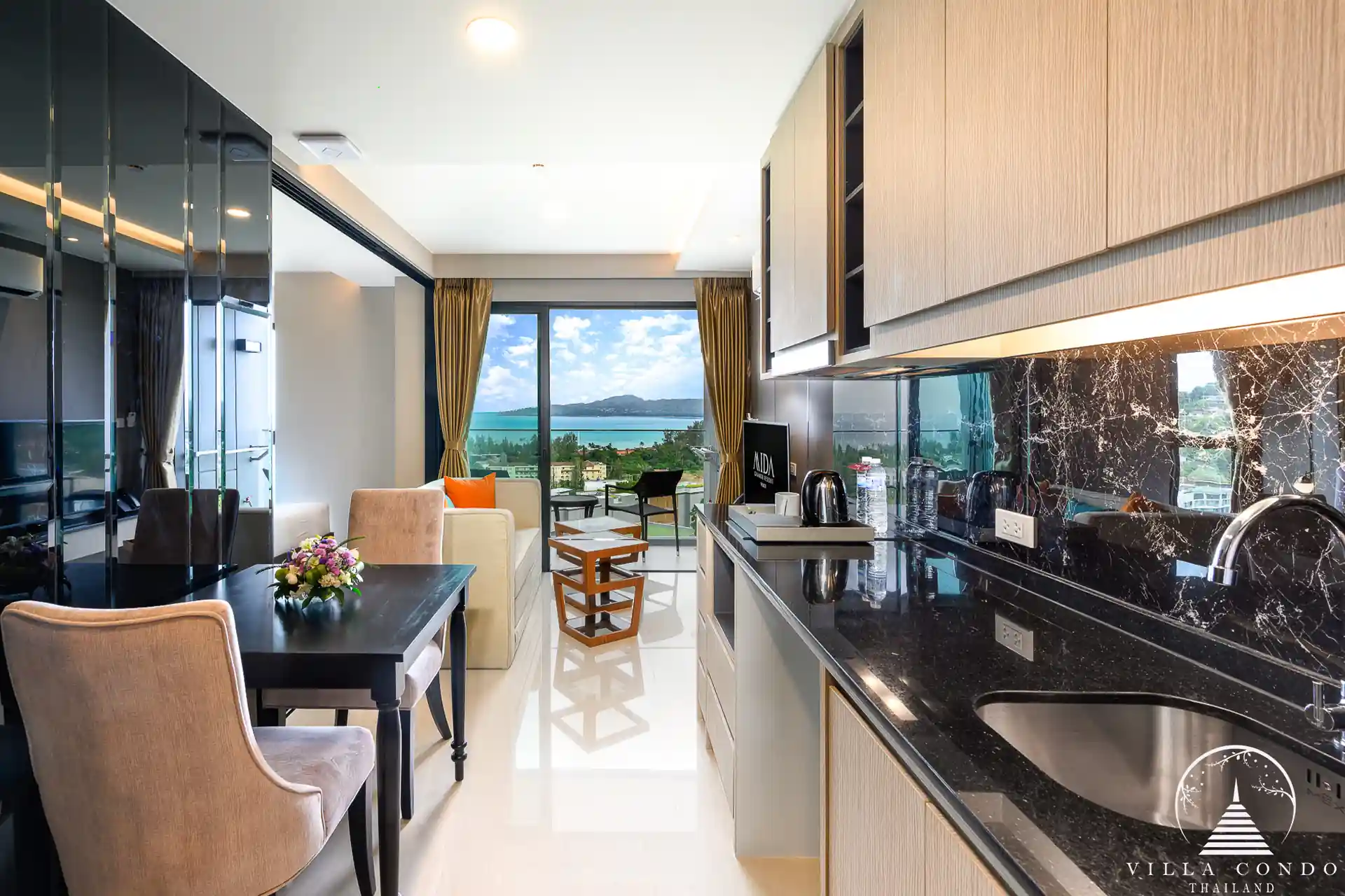 Living area with panoramic sea views at Panora Sea View Condominium.