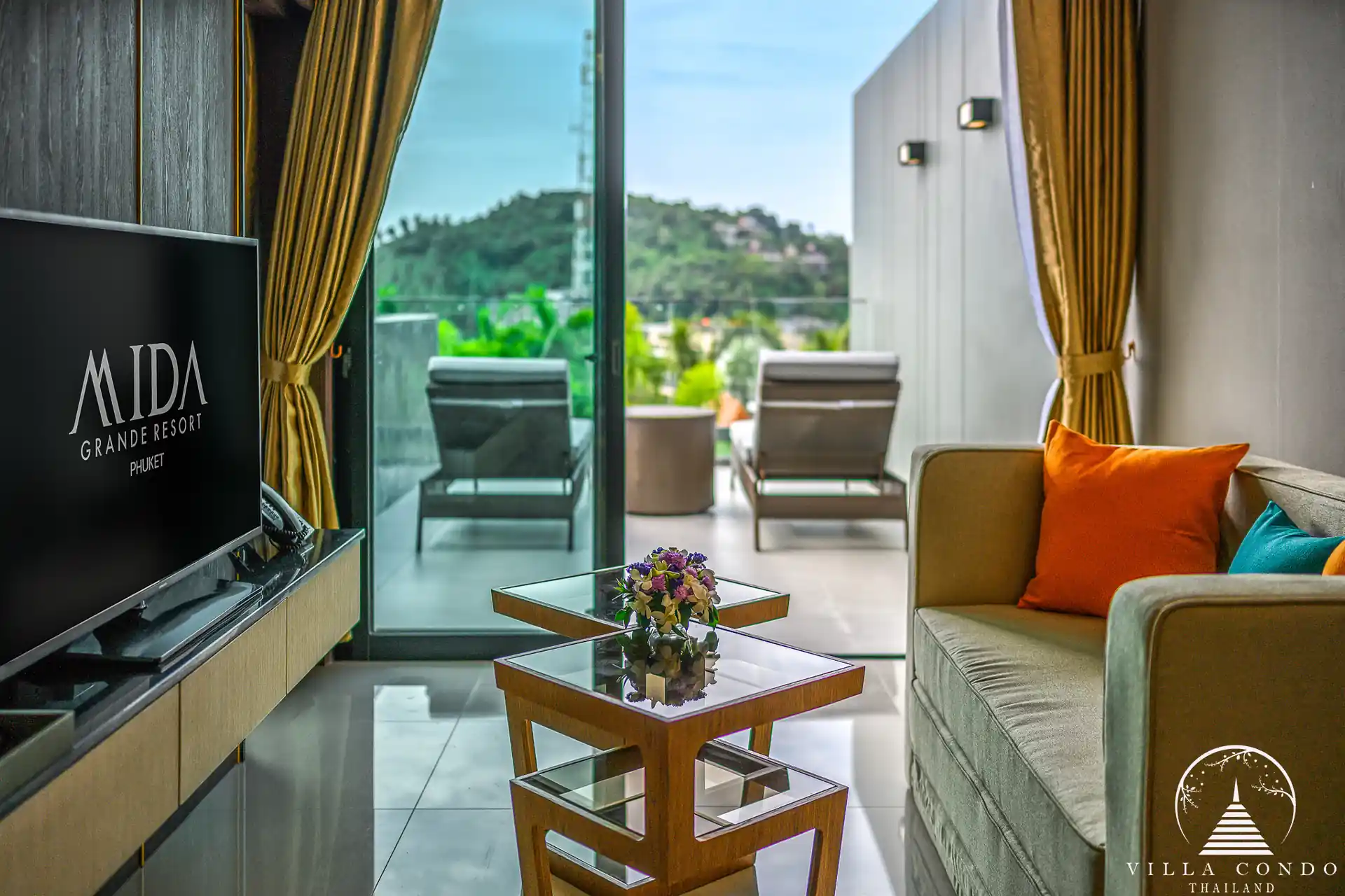 Living area with panoramic sea views at Panora Sea View Condominium.