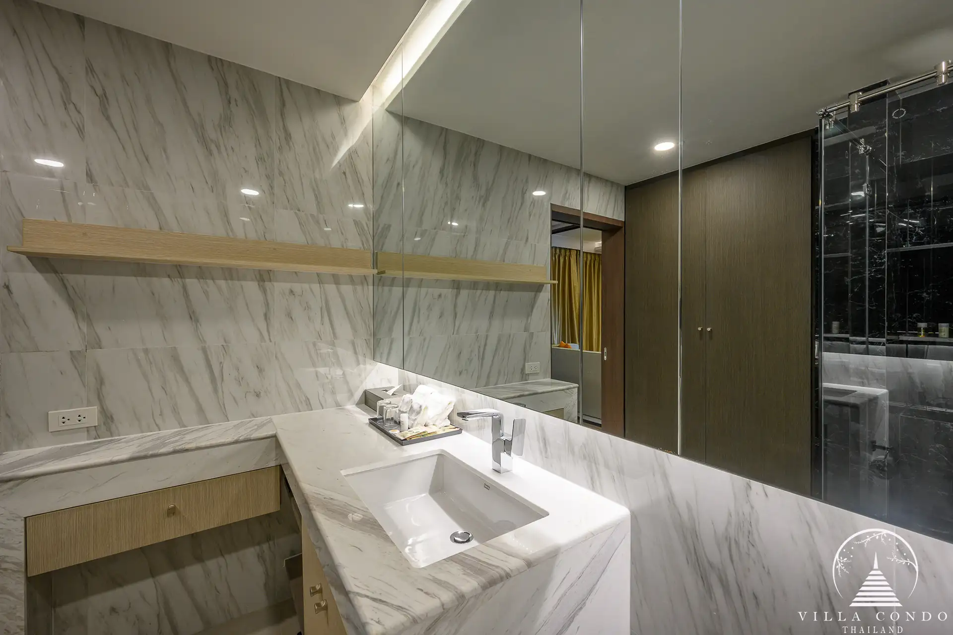 Modern bathroom amenities in Panora Sea View Condominium.