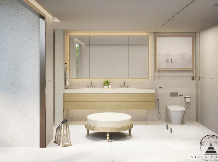 The elegant master bathroom in a QAV Residence villa with modern fixtures.