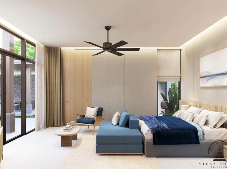The master bedroom in a QAV Residence villa with a view of the garden.