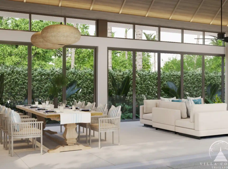 The spacious living area in a QAV Residence villa with panoramic windows.