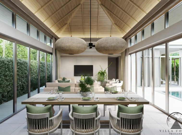 The elegant dining area in a QAV Residence villa with modern decor.
