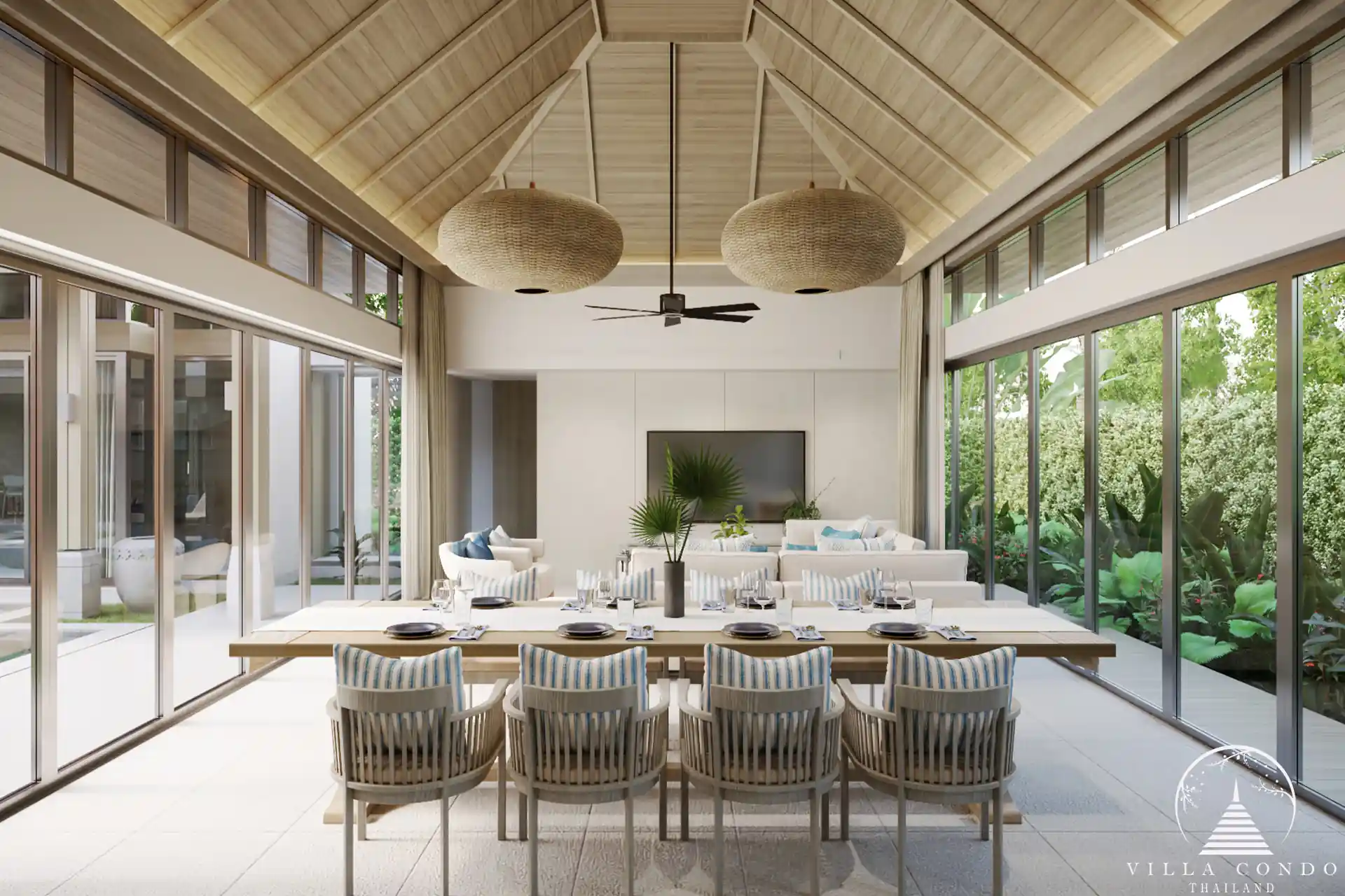 The elegant dining area in a QAV Residence villa with modern decor.