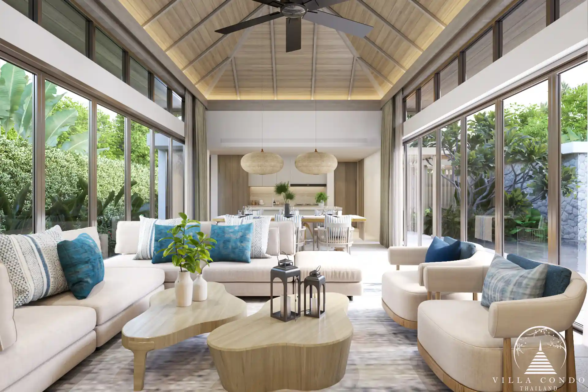 The spacious living area in a QAV Residence villa with panoramic windows.
