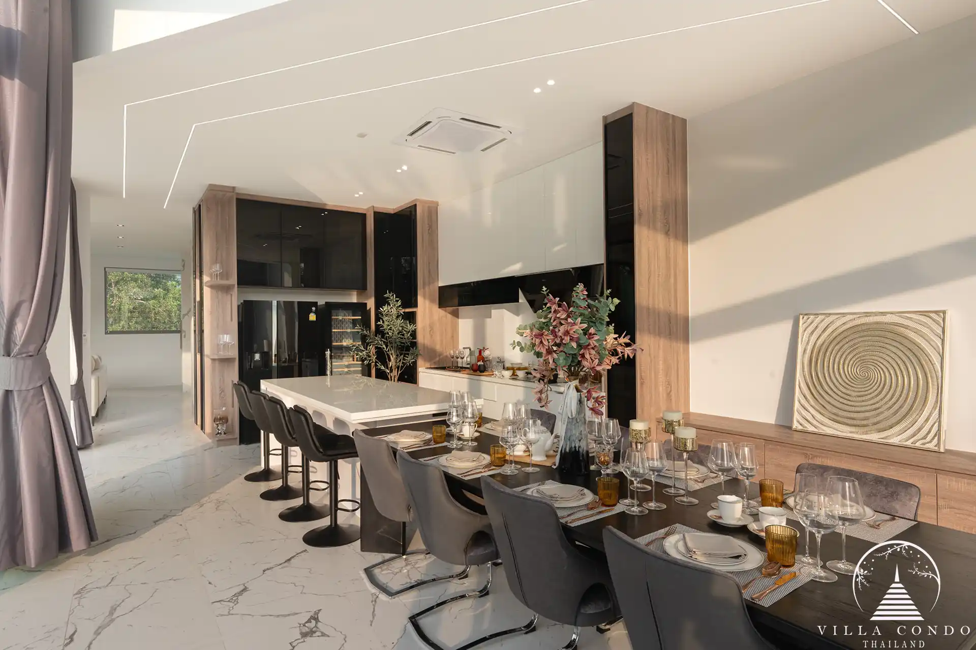 Stylish European kitchen with dining area in The PRIVA Golf Course Villa.