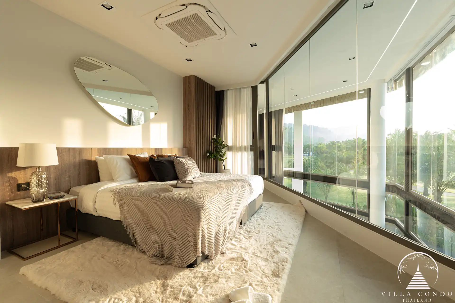 Elegant master bedroom with golf course view in The PRIVA Golf Course Villa.