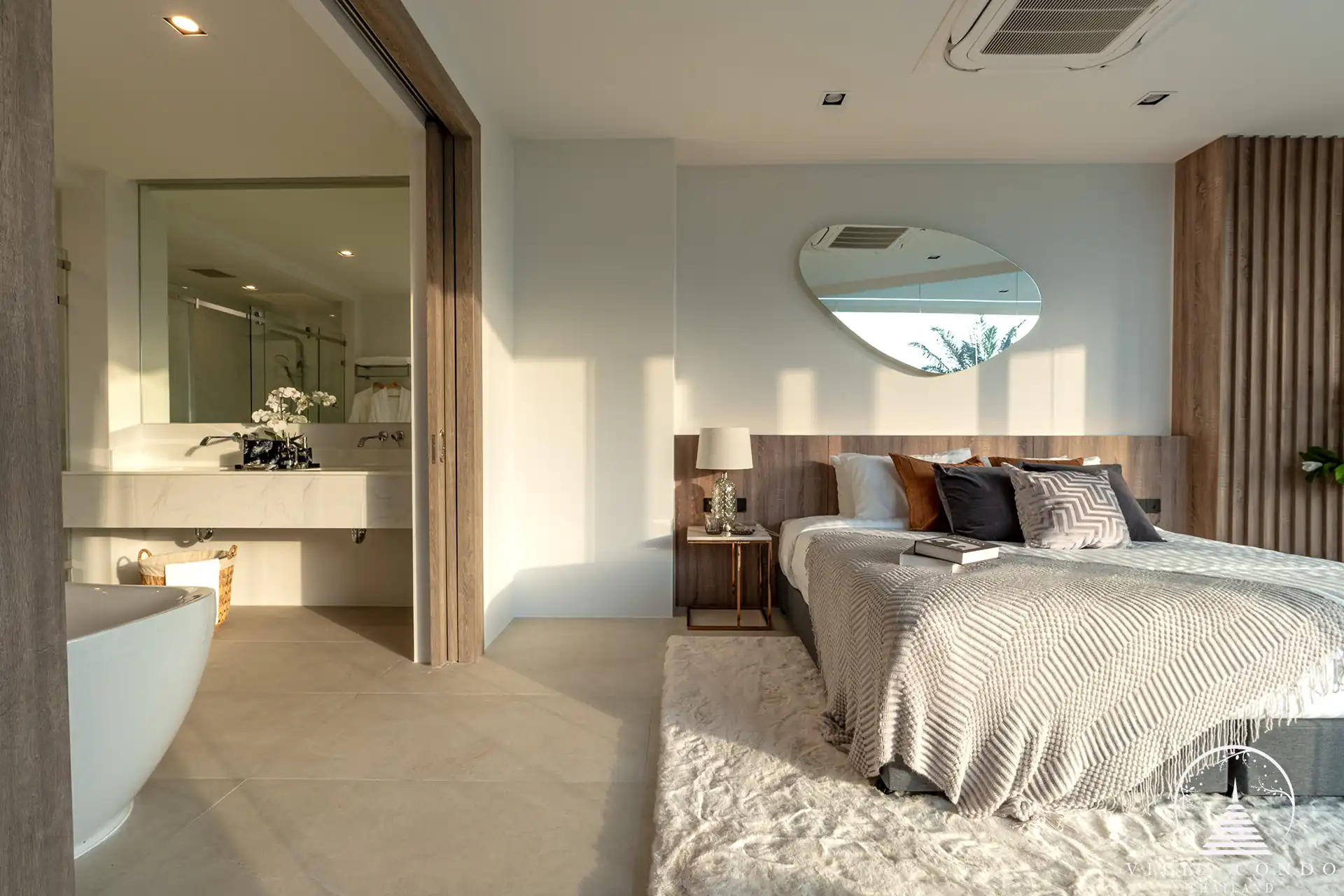 Elegant master bedroom with golf course view in The PRIVA Golf Course Villa.