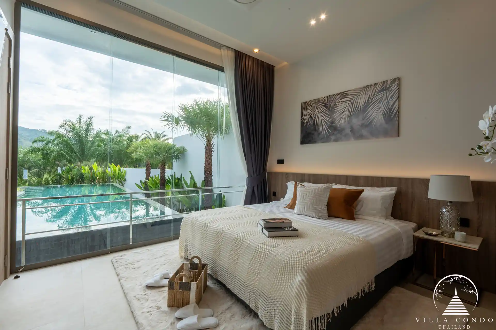 Luxurious bedroom with a view of the golf course in The PRIVA Golf Course Villa.