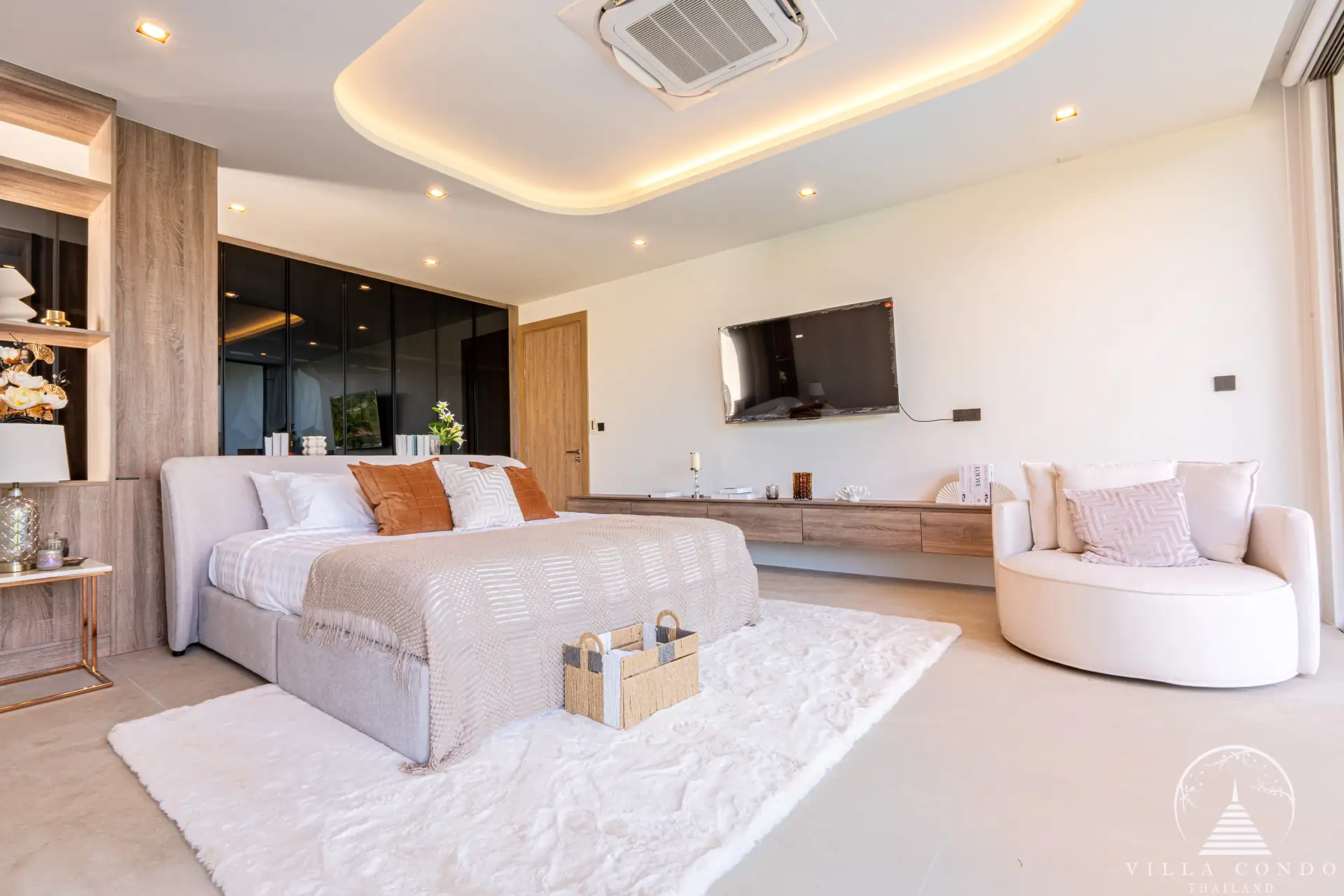 Luxurious bedroom with a view of the golf course in The PRIVA Golf Course Villa.