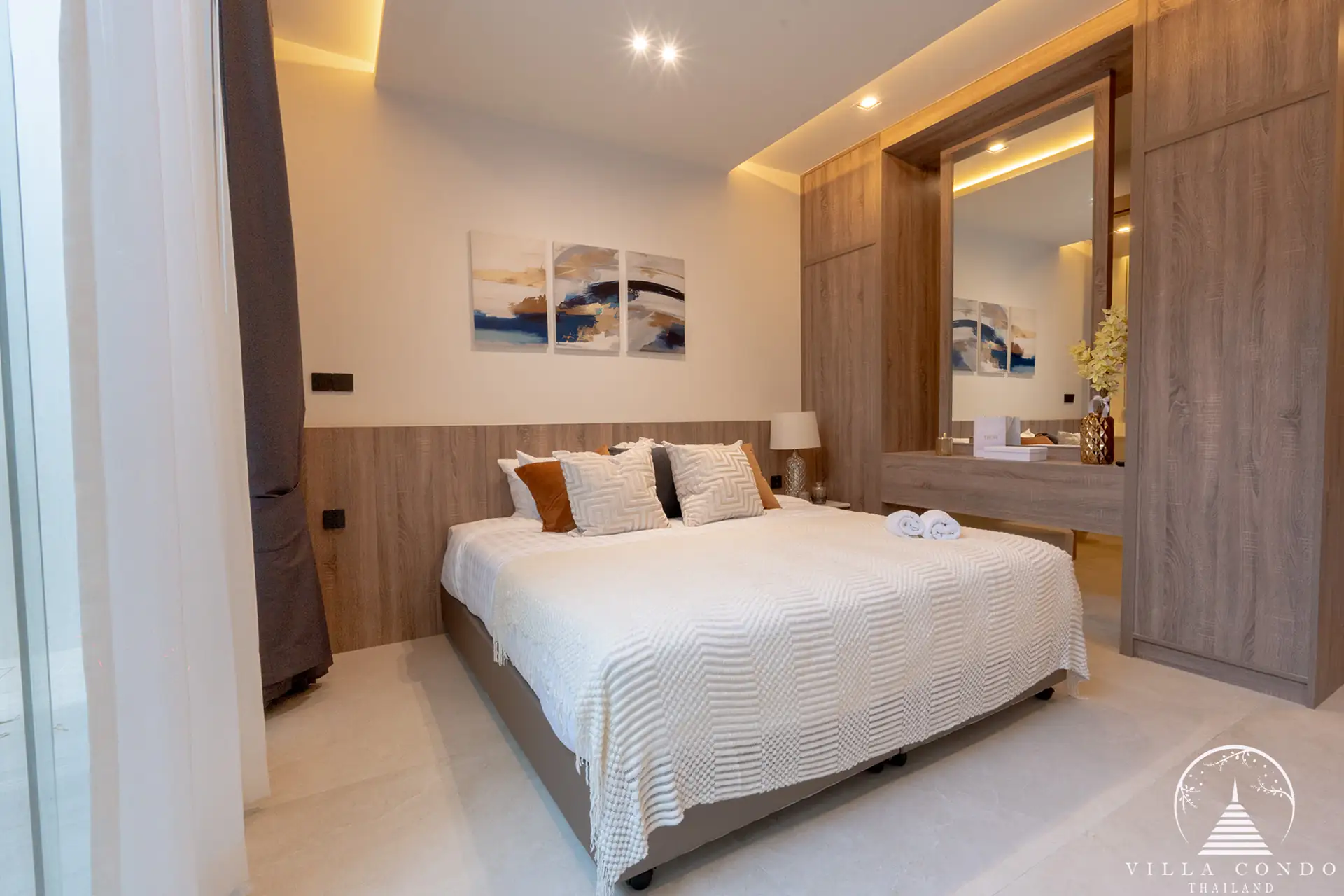 Luxurious bedroom with a view of the golf course in The PRIVA Golf Course Villa.