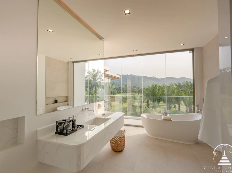 Luxurious master bathroom with bathtub in The PRIVA Golf Course Villa.