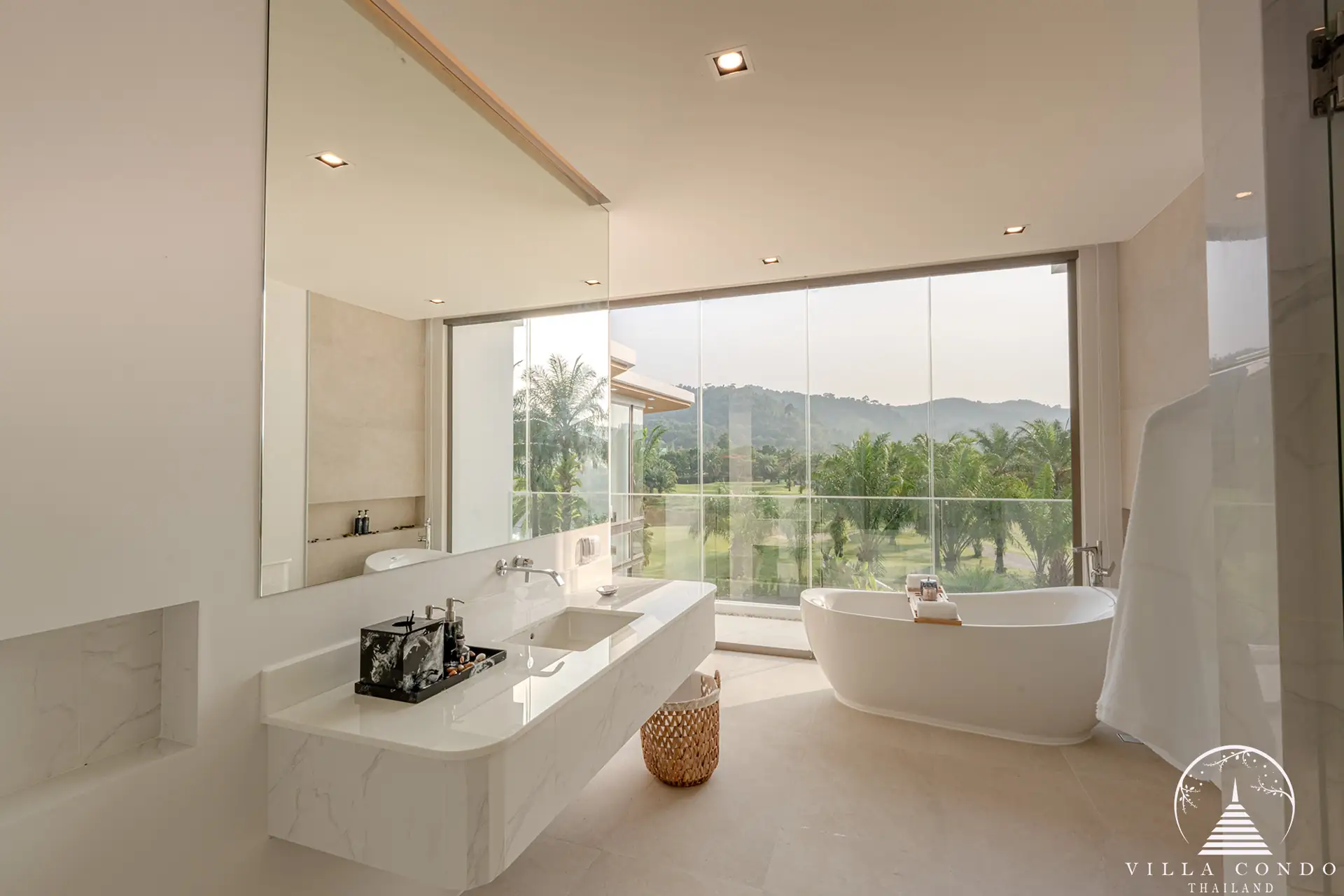 Luxurious master bathroom with bathtub in The PRIVA Golf Course Villa.